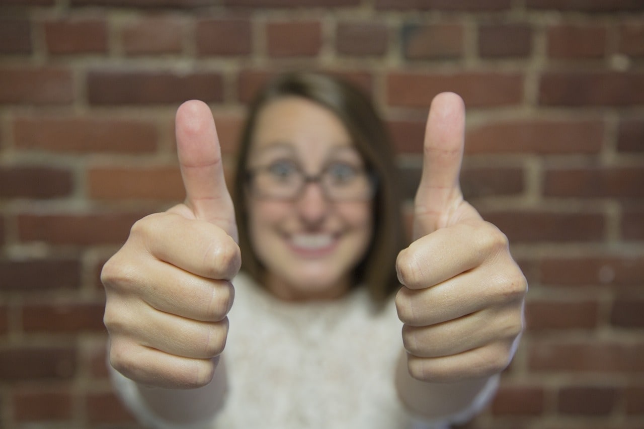 A woman giving a product review for contact lenses.